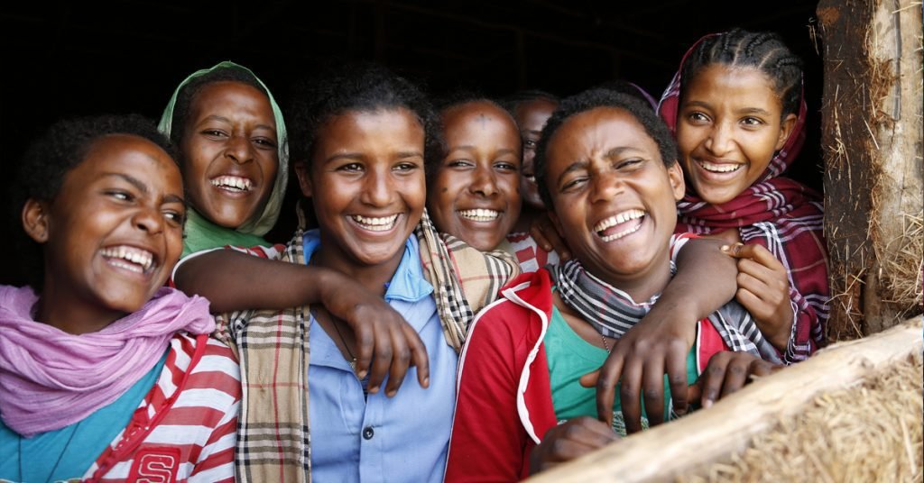 a group of women smiling